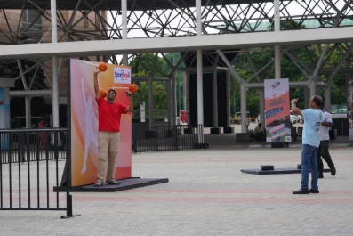An event setup at an outdoor venue entrance, filmed on location