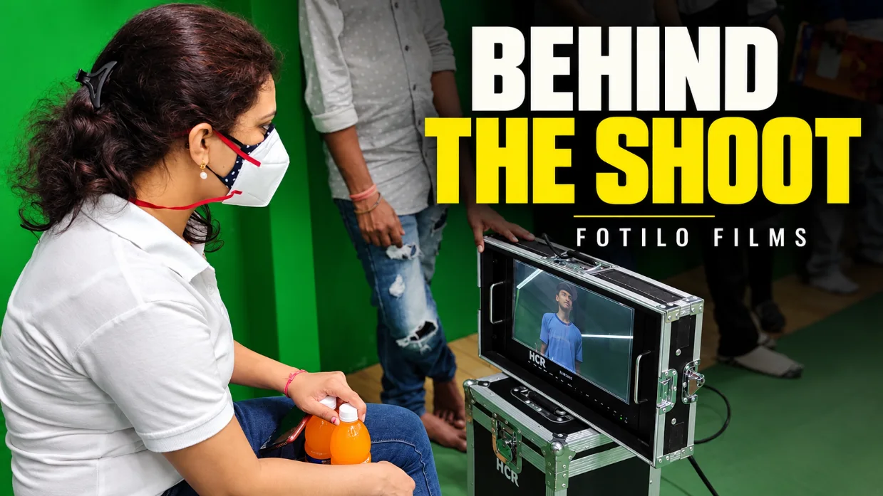 "Behind the Shoot" cover — a Fotilo Films producer at the monitor during a green-screen shoot